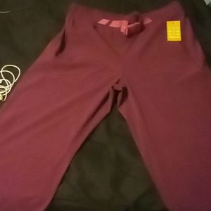 Two pairs of pants title nine and a hurley winter hat